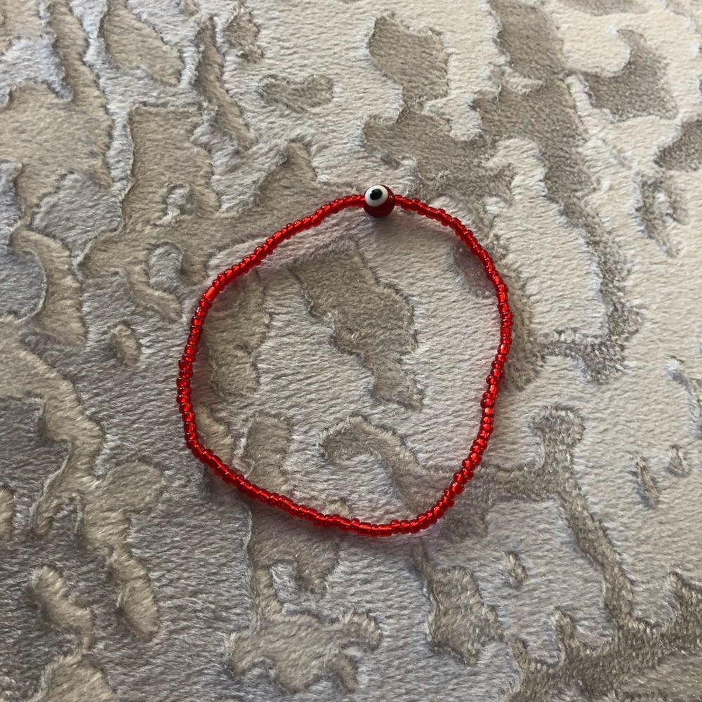 Red seed bead evil eye bracelet